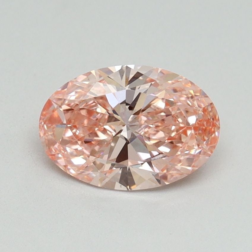 Loose Diamond - OVAL 1.0ct Fancy Vivid Pink VS2: Loose Diamond - OVAL 1.0ct Fancy Vivid Pink VS2 Source: This is a real non-mined Diamond that has been grown in a lab Shape: OVAL Carats: 1.0 Color: Fancy Vivid Pink Certification: IGI Video: