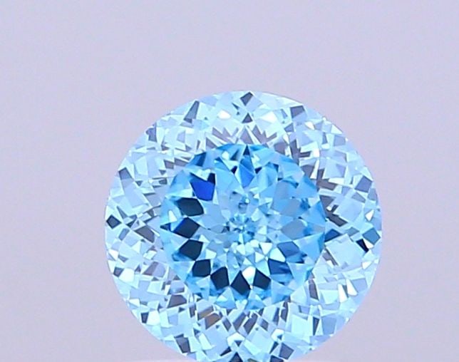 Loose Diamond - ROUND 1.0ct Fancy Vivid Blue VS2: Loose Diamond - ROUND 1.0ct Fancy Vivid Blue VS2 Source: This is a real non-mined Diamond that has been grown in a lab Shape: ROUND Carats: 1.0 Color: Fancy Vivid Blue Certification: IGI Video: