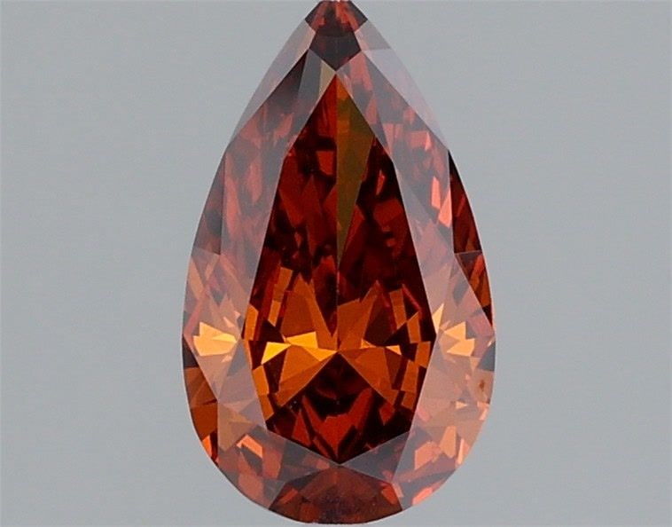 Loose Diamond - PEAR 1.0ct Fancy Vivid Orange VVS2: Loose Diamond - PEAR 1.0ct Fancy Vivid Orange VVS2 Source: This is a real non-mined Diamond that has been grown in a lab Shape: PEAR Carats: 1.0 Color: Fancy Vivid Orange Certification: IGI Video: