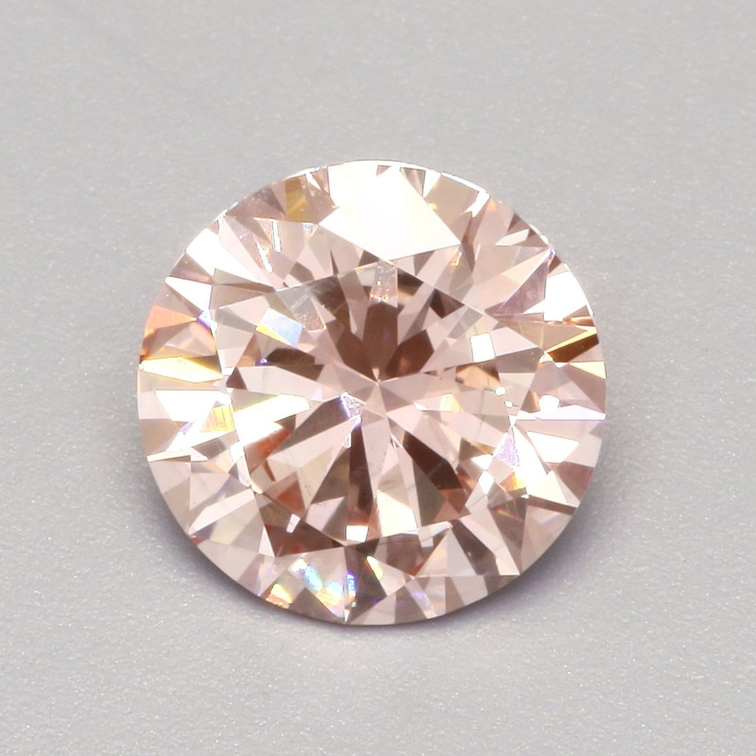 Loose Diamond - ROUND 1.65ct Fancy Vivid Pink SI1: Loose Diamond - ROUND 1.65ct Fancy Vivid Pink SI1 Source: This is a real non-mined Diamond that has been grown in a lab Shape: ROUND Carats: 1.65 Color: Fancy Vivid Pink Certification: IGI Video: