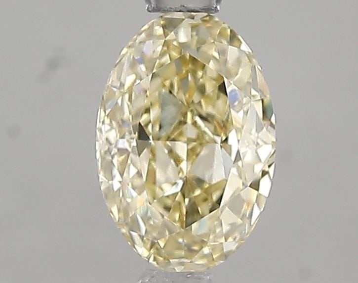 Loose Diamond - OVAL 1.05ct Fancy Light Yellow VS1: Loose Diamond - OVAL 1.05ct Fancy Light Yellow VS1 Source: This is a real non-mined Diamond that has been grown in a lab Shape: OVAL Carats: 1.05 Color: Fancy Light Yellow Certification: IGI Video: