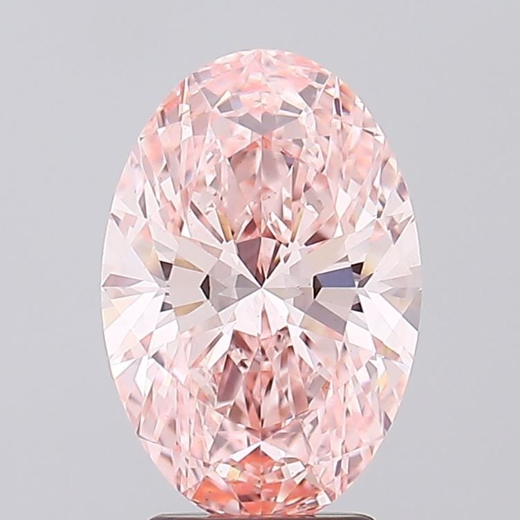 Loose Diamond - OVAL 3.21ct Fancy Vivid Pink VS1: Loose Diamond - OVAL 3.21ct Fancy Vivid Pink VS1 Source: This is a real non-mined Diamond that has been grown in a lab Shape: OVAL Carats: 3.21 Color: Fancy Vivid Pink Certification: IGI Video: