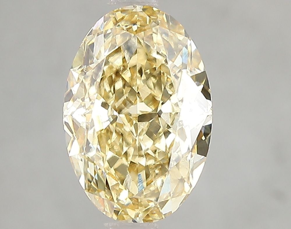 Loose Diamond - OVAL 3.03ct Fancy Intense Yellow VS2: Loose Diamond - OVAL 3.03ct Fancy Intense Yellow VS2 Source: This is a real non-mined Diamond that has been grown in a lab Shape: OVAL Carats: 3.03 Color: Fancy Intense Yellow Certification: IGI