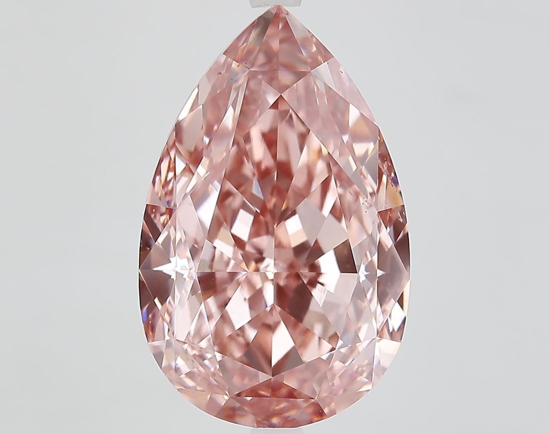 Loose Diamond - PEAR 11.27ct Fancy Vivid Pink VVS2: Loose Diamond - PEAR 11.27ct Fancy Vivid Pink VVS2 Source: This is a real non-mined Diamond that has been grown in a lab Shape: PEAR Carats: 11.27 Color: Fancy Vivid Pink Certification: IGI Video:
