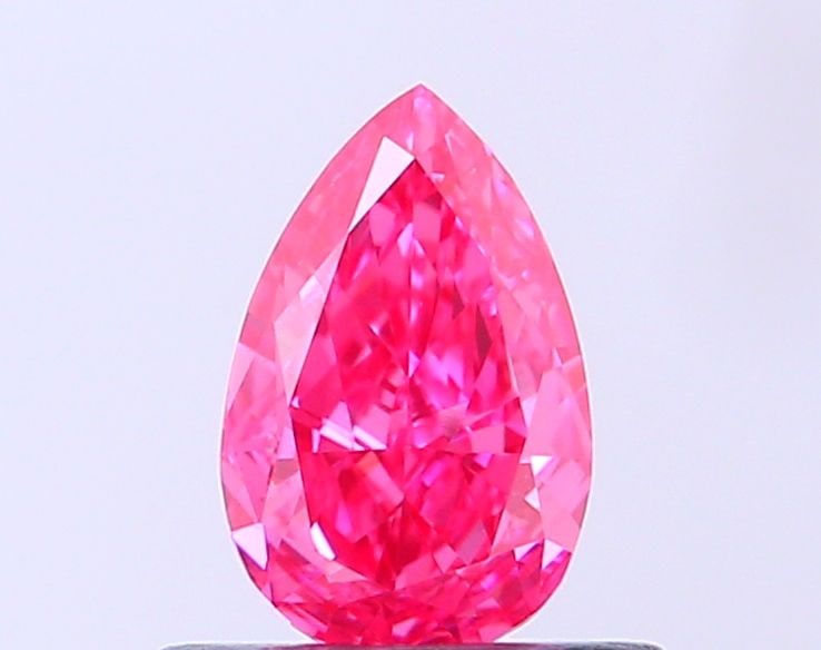 Loose Diamond - PEAR 0.46ct Fancy Vivid Pink VS1: Loose Diamond - PEAR 0.46ct Fancy Vivid Pink VS1 Source: This is a real non-mined Diamond that has been grown in a lab Shape: PEAR Carats: 0.46 Color: Fancy Vivid Pink Certification: IGI Video:
