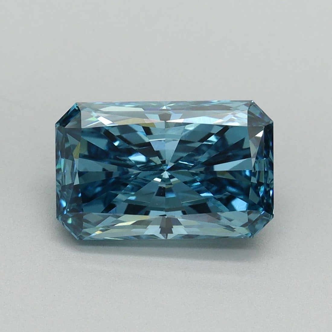 Loose Diamond - RADIANT 2.08ct Fancy Vivid Blue VVS2: Loose Diamond - RADIANT 2.08ct Fancy Vivid Blue VVS2 Source: This is a real non-mined Diamond that has been grown in a lab Shape: RADIANT Carats: 2.08 Color: Fancy Vivid Blue Certification: IGI Video: