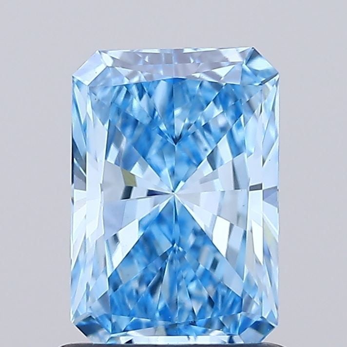 Loose Diamond - RADIANT 0.91ct Fancy Vivid Blue VVS2: Loose Diamond - RADIANT 0.91ct Fancy Vivid Blue VVS2 Source: This is a real non-mined Diamond that has been grown in a lab Shape: RADIANT Carats: 0.91 Color: Fancy Vivid Blue Certification: IGI
