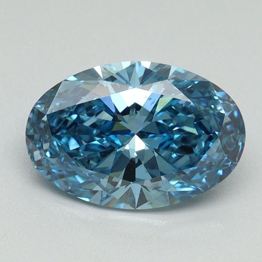 Loose Diamond - OVAL 1.55ct Fancy Vivid Blue VS2: Loose Diamond - OVAL 1.55ct Fancy Vivid Blue VS2 Source: This is a real non-mined Diamond that has been grown in a lab Shape: OVAL Carats: 1.55 Color: Fancy Vivid Blue Certification: IGI Video: