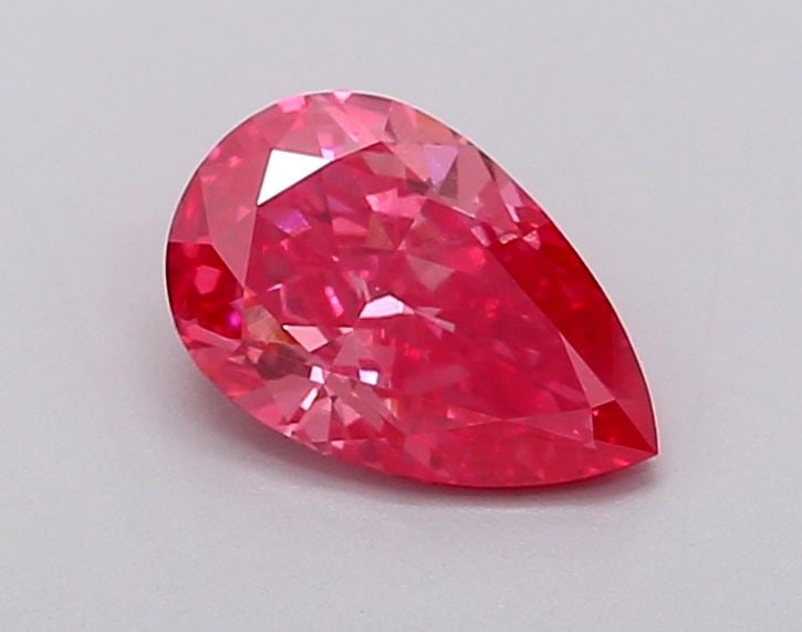 Loose Diamond - PEAR 1.0ct Fancy Vivid Pink VS1: Loose Diamond - PEAR 1.0ct Fancy Vivid Pink VS1 Source: This is a real non-mined Diamond that has been grown in a lab Shape: PEAR Carats: 1.0 Color: Fancy Vivid Pink Certification: IGI Video: