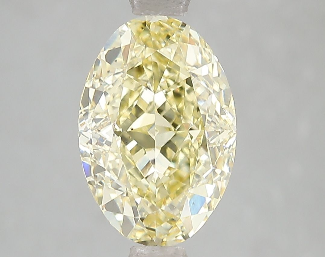 Loose Diamond - OVAL 3.06ct Fancy Intense Yellow VS2: Loose Diamond - OVAL 3.06ct Fancy Intense Yellow VS2 Source: This is a real non-mined Diamond that has been grown in a lab Shape: OVAL Carats: 3.06 Color: Fancy Intense Yellow Certification: IGI Video