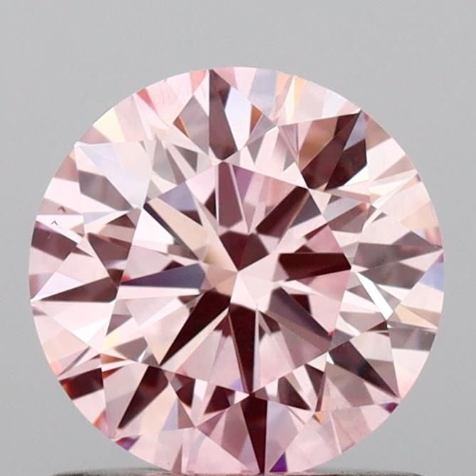 Ideal Loose Diamond - ROUND 0.89ct Fancy Intense Pink VS2: Ideal Loose Diamond - ROUND 0.89ct Fancy Intense Pink VS2 Source: This is a real non-mined Diamond that has been grown in a lab Shape: ROUND Carats: 0.89 Color: Fancy Intense Pink Certification: IGI V