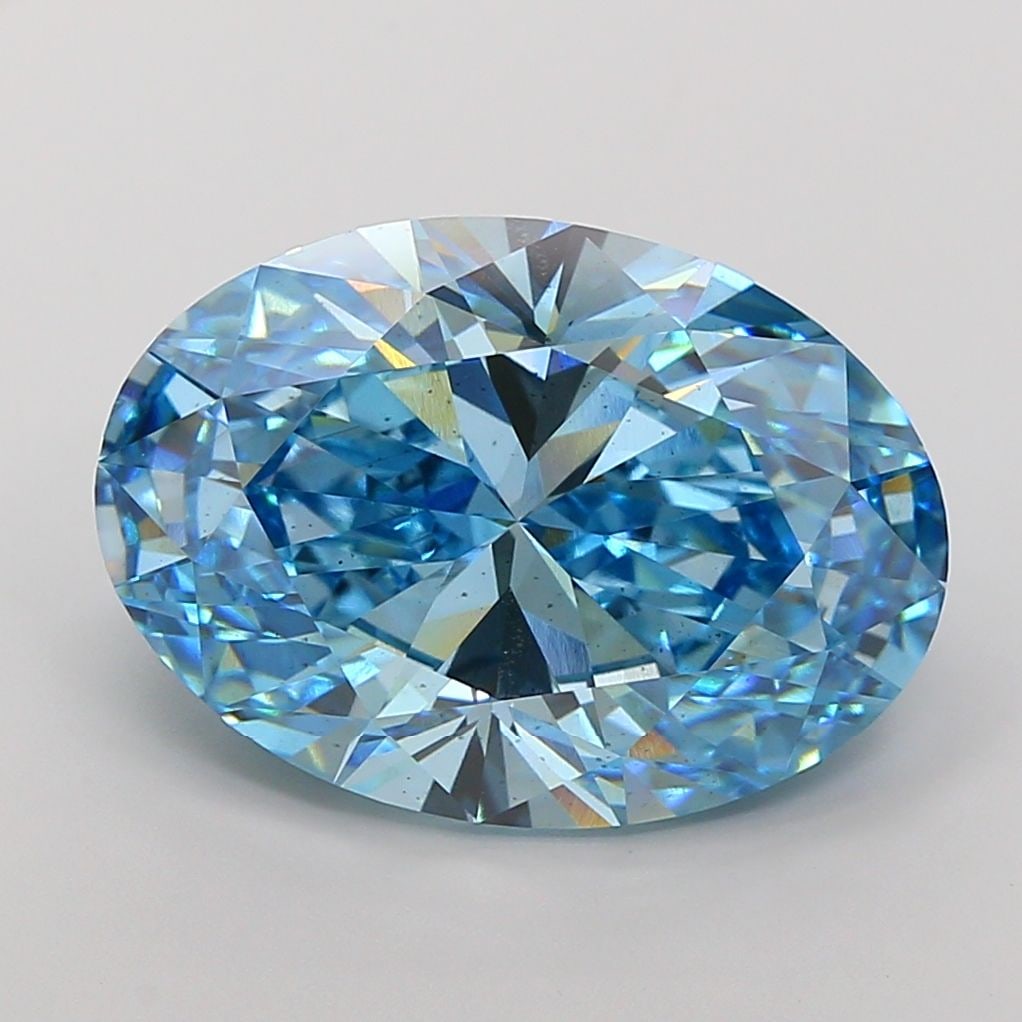 Loose Diamond - OVAL 14.08ct Fancy Vivid Blue VS2: Loose Diamond - OVAL 14.08ct Fancy Vivid Blue VS2 Source: This is a real non-mined Diamond that has been grown in a lab Shape: OVAL Carats: 14.08 Color: Fancy Vivid Blue Certification: IGI Video: