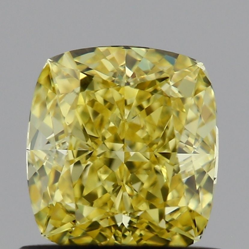 Loose Diamond - CUSHION MODIFIED 0.83ct Fancy Yellow VS2: Loose Diamond - CUSHION MODIFIED 0.83ct Fancy Yellow VS2 Source: This is a real non-mined Diamond that has been grown in a lab Shape: CUSHION MODIFIED Carats: 0.83 Color: Fancy Yellow Certification: I