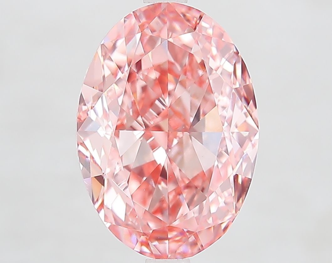 Loose Diamond - OVAL 5.04ct Fancy Vivid Pink VVS2: Loose Diamond - OVAL 5.04ct Fancy Vivid Pink VVS2 Source: This is a real non-mined Diamond that has been grown in a lab Shape: OVAL Carats: 5.04 Color: Fancy Vivid Pink Certification: IGI Video: