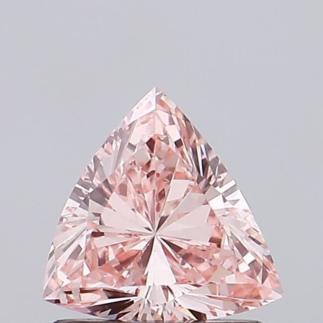Loose Diamond - TRIANGULAR 0.7ct Fancy Intense Pink VS2: Loose Diamond - TRIANGULAR 0.7ct Fancy Intense Pink VS2 Source: This is a real non-mined Diamond that has been grown in a lab Shape: TRIANGULAR Carats: 0.7 Color: Fancy Intense Pink Certification: IGI