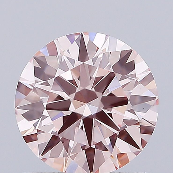 Loose Diamond - ROUND 0.91ct Fancy Intense Pink VS1: Loose Diamond - ROUND 0.91ct Fancy Intense Pink VS1 Source: This is a real non-mined Diamond that has been grown in a lab Shape: ROUND Carats: 0.91 Color: Fancy Intense Pink Certification: IGI Video: