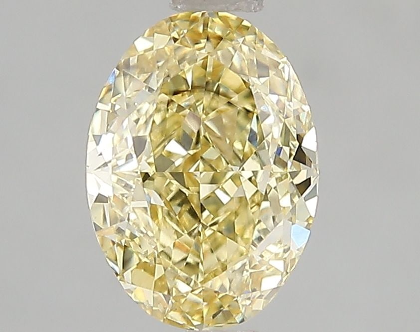 Loose Diamond - OVAL 2.01ct Fancy Vivid Yellow VS2: Loose Diamond - OVAL 2.01ct Fancy Vivid Yellow VS2 Source: This is a real non-mined Diamond that has been grown in a lab Shape: OVAL Carats: 2.01 Color: Fancy Vivid Yellow Certification: IGI Video: