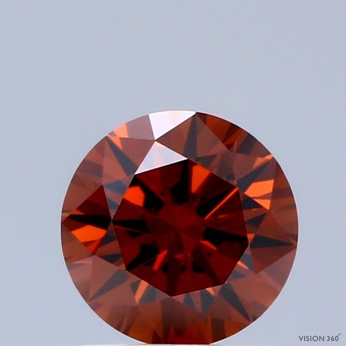 Ideal Loose Diamond - ROUND 0.68ct Fancy Deep Orange VVS2: Ideal Loose Diamond - ROUND 0.68ct Fancy Deep Orange VVS2 Source: This is a real non-mined Diamond that has been grown in a lab Shape: ROUND Carats: 0.68 Color: Fancy Deep Orange Certification: IGI Vi