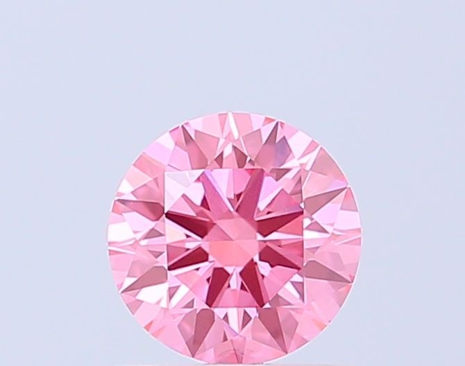 Ideal Loose Diamond - ROUND 1.03ct Fancy Vivid Pink VVS2: Ideal Loose Diamond - ROUND 1.03ct Fancy Vivid Pink VVS2 Source: This is a real non-mined Diamond that has been grown in a lab Shape: ROUND Carats: 1.03 Color: Fancy Vivid Pink Certification: IGI Vide