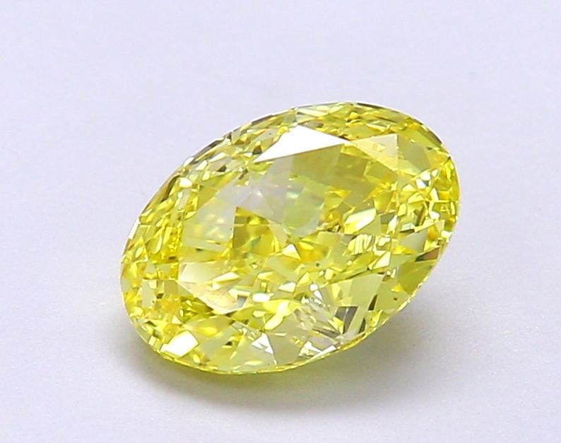 Loose Diamond - OVAL 1.72ct Fancy Vivid Yellow VS1: Loose Diamond - OVAL 1.72ct Fancy Vivid Yellow VS1 Source: This is a real non-mined Diamond that has been grown in a lab Shape: OVAL Carats: 1.72 Color: Fancy Vivid Yellow Certification: IGI Video: