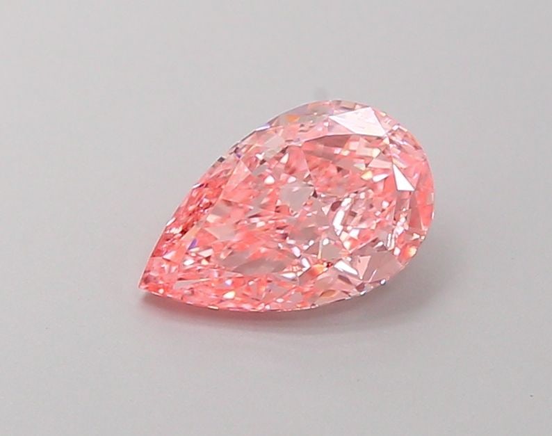 Loose Diamond - PEAR 1.2ct Fancy Vivid Pink VVS2: Loose Diamond - PEAR 1.2ct Fancy Vivid Pink VVS2 Source: This is a real non-mined Diamond that has been grown in a lab Shape: PEAR Carats: 1.2 Color: Fancy Vivid Pink Certification: IGI Video: