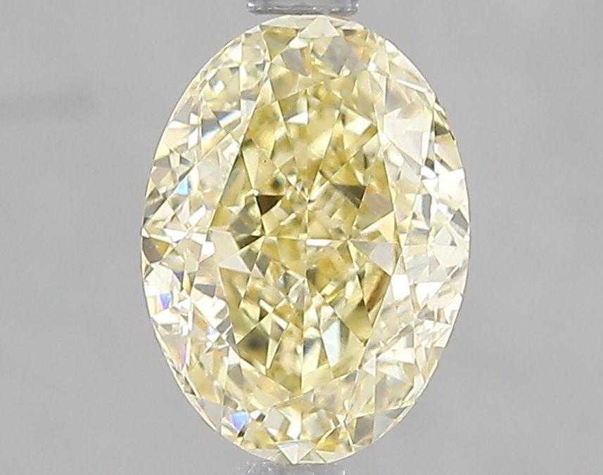 Loose Diamond - OVAL 2.02ct Fancy Intense Yellow VVS2: Loose Diamond - OVAL 2.02ct Fancy Intense Yellow VVS2 Source: This is a real non-mined Diamond that has been grown in a lab Shape: OVAL Carats: 2.02 Color: Fancy Intense Yellow Certification: IGI Vide