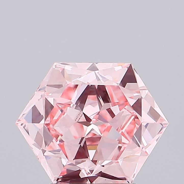 Loose Diamond - HEXAGONAL 2.57ct Fancy Vivid Pink VVS2: Loose Diamond - HEXAGONAL 2.57ct Fancy Vivid Pink VVS2 Source: This is a real non-mined Diamond that has been grown in a lab Shape: HEXAGONAL Carats: 2.57 Color: Fancy Vivid Pink Certification: IGI Vi