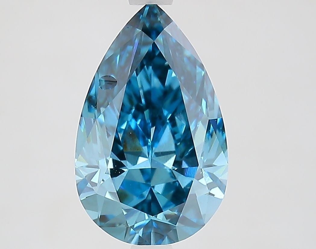 Loose Diamond - PEAR 2.65ct Fancy Vivid Blue VS1: Loose Diamond - PEAR 2.65ct Fancy Vivid Blue VS1 Source: This is a real non-mined Diamond that has been grown in a lab Shape: PEAR Carats: 2.65 Color: Fancy Vivid Blue Certification: IGI Video: