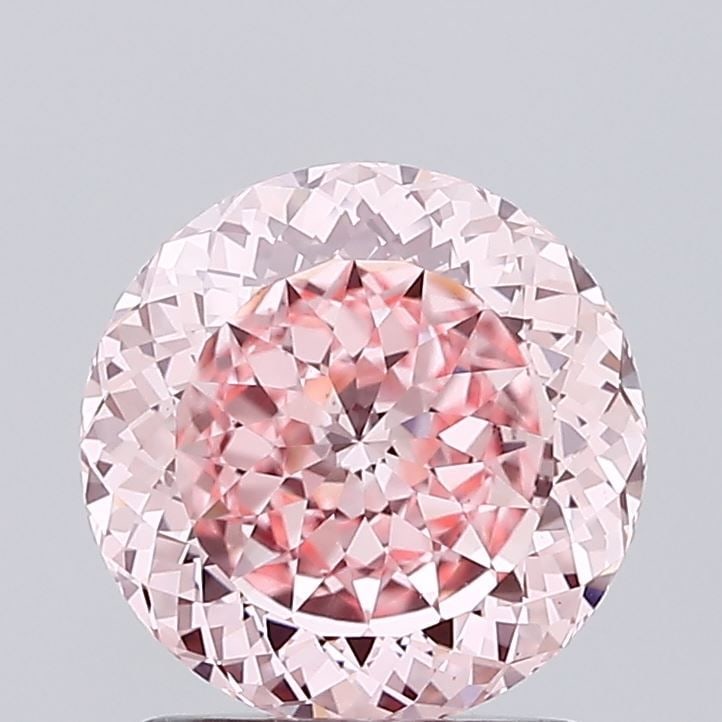 Loose Diamond - ROUND 1.62ct Fancy Vivid Pink VVS2: Loose Diamond - ROUND 1.62ct Fancy Vivid Pink VVS2 Source: This is a real non-mined Diamond that has been grown in a lab Shape: ROUND Carats: 1.62 Color: Fancy Vivid Pink Certification: IGI Video: