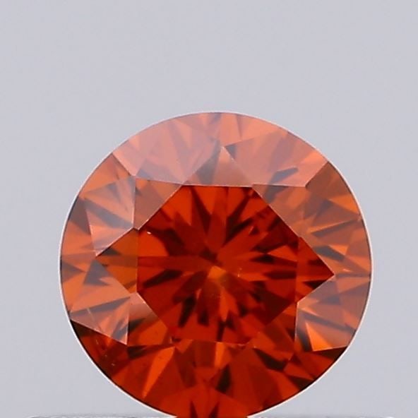 Loose Diamond - ROUND 0.35ct Fancy Vivid Orange SI1: Loose Diamond - ROUND 0.35ct Fancy Vivid Orange SI1 Source: This is a real non-mined Diamond that has been grown in a lab Shape: ROUND Carats: 0.35 Color: Fancy Vivid Orange Certification: IGI Video:
