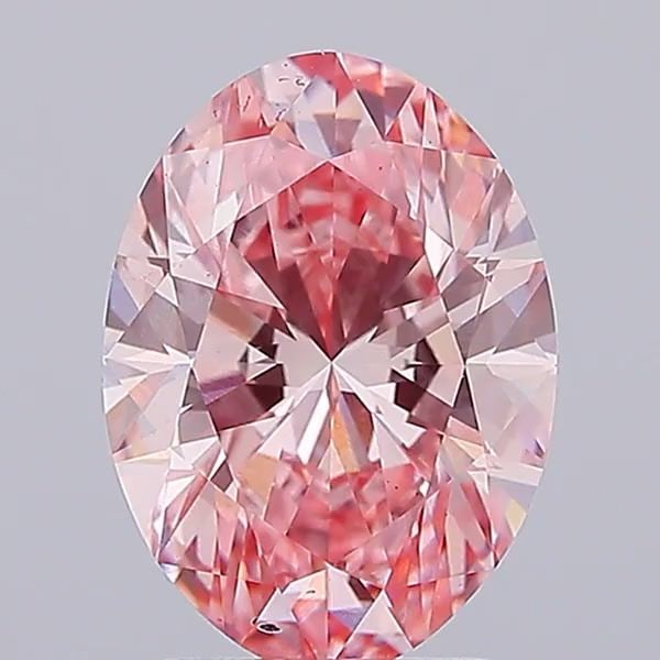 Loose Diamond - OVAL 3.0ct Fancy Vivid Pink VS2: Loose Diamond - OVAL 3.0ct Fancy Vivid Pink VS2 Source: This is a real non-mined Diamond that has been grown in a lab Shape: OVAL Carats: 3.0 Color: Fancy Vivid Pink Certification: IGI Video: