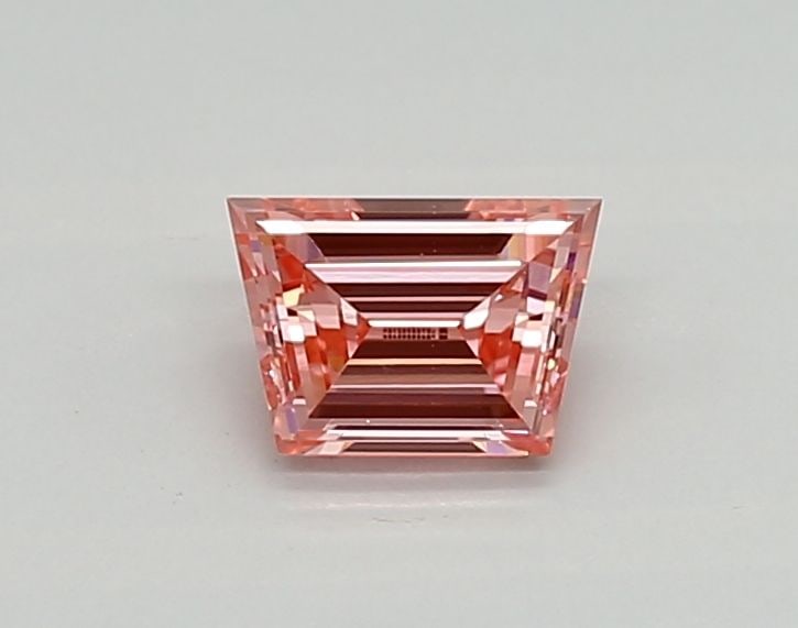 Loose Diamond - TRAPEZOID 0.41ct Fancy Vivid Pink VVS2: Loose Diamond - TRAPEZOID 0.41ct Fancy Vivid Pink VVS2 Source: This is a real non-mined Diamond that has been grown in a lab Shape: TRAPEZOID Carats: 0.41 Color: Fancy Vivid Pink Certification: IGI Vi