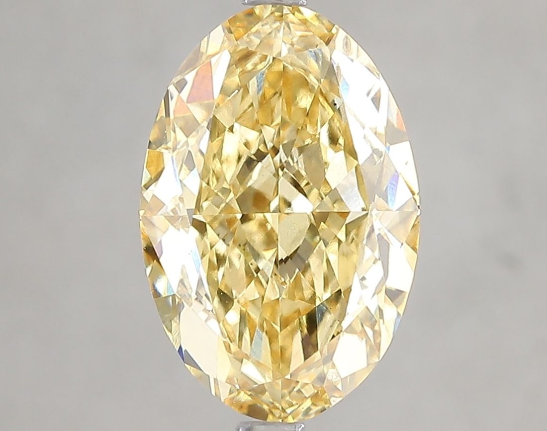 Loose Diamond - OVAL 5.05ct Fancy Yellow VS1: Loose Diamond - OVAL 5.05ct Fancy Yellow VS1 Source: This is a real non-mined Diamond that has been grown in a lab Shape: OVAL Carats: 5.05 Color: Fancy Yellow Certification: IGI Video: