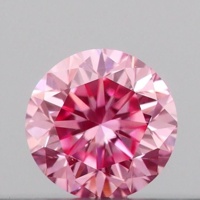 Loose Diamond - ROUND 0.12ct Fancy Vivid Pink VVS2: Loose Diamond - ROUND 0.12ct Fancy Vivid Pink VVS2 Source: This is a real non-mined Diamond that has been grown in a lab Shape: ROUND Carats: 0.12 Color: Fancy Vivid Pink Certification: IGI Video: