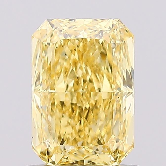Loose Diamond - RADIANT 1.07ct Fancy Vivid Yellow VS1: Loose Diamond - RADIANT 1.07ct Fancy Vivid Yellow VS1 Source: This is a real non-mined Diamond that has been grown in a lab Shape: RADIANT Carats: 1.07 Color: Fancy Vivid Yellow Certification: IGI Vid