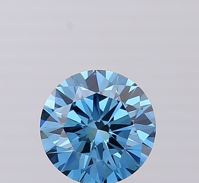 Ideal Loose Diamond - ROUND 1.21ct Fancy Vivid Blue VS1: Ideal Loose Diamond - ROUND 1.21ct Fancy Vivid Blue VS1 Source: This is a real non-mined Diamond that has been grown in a lab Shape: ROUND Carats: 1.21 Color: Fancy Vivid Blue Certification: IGI