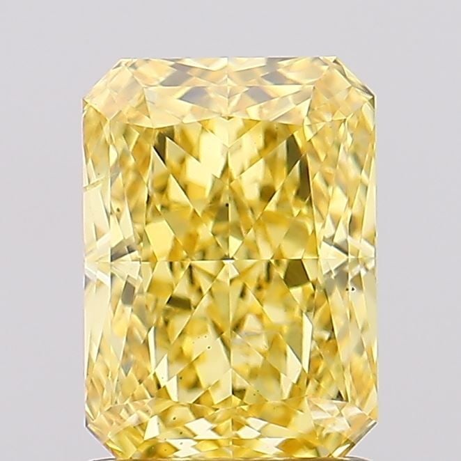 Loose Diamond - RADIANT 1.68ct Fancy Vivid Yellow VS2: Loose Diamond - RADIANT 1.68ct Fancy Vivid Yellow VS2 Source: This is a real non-mined Diamond that has been grown in a lab Shape: RADIANT Carats: 1.68 Color: Fancy Vivid Yellow Certification: IGI Vid