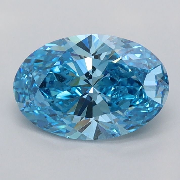Loose Diamond - OVAL 1.04ct Fancy Vivid Blue VVS2: Loose Diamond - OVAL 1.04ct Fancy Vivid Blue VVS2 Source: This is a real non-mined Diamond that has been grown in a lab Shape: OVAL Carats: 1.04 Color: Fancy Vivid Blue Certification: IGI Video: