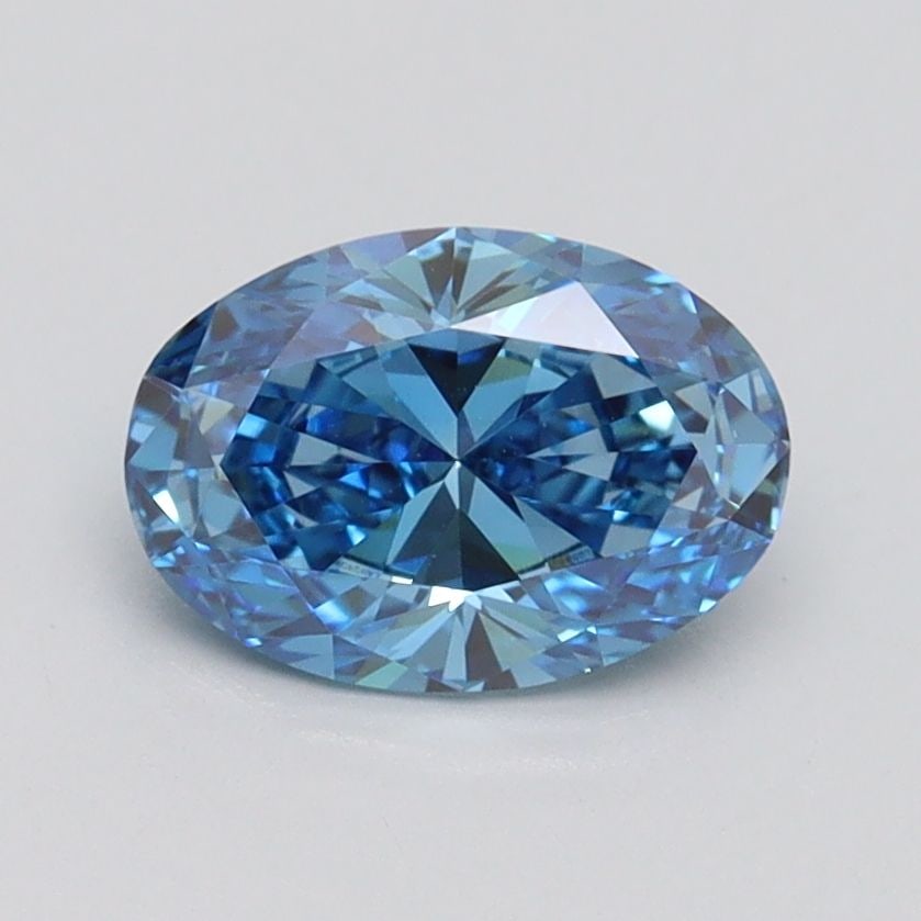 Loose Diamond - OVAL 1.01ct Fancy Vivid Blue VVS2: Loose Diamond - OVAL 1.01ct Fancy Vivid Blue VVS2 Source: This is a real non-mined Diamond that has been grown in a lab Shape: OVAL Carats: 1.01 Color: Fancy Vivid Blue Certification: IGI Video: