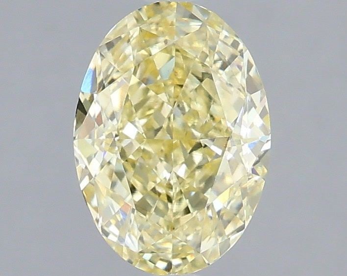 Loose Diamond - OVAL 1.56ct Fancy Yellow VVS2: Loose Diamond - OVAL 1.56ct Fancy Yellow VVS2 Source: This is a real non-mined Diamond that has been grown in a lab Shape: OVAL Carats: 1.56 Color: Fancy Yellow Certification: IGI Video: