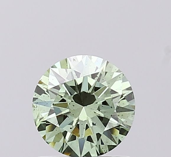 Loose Diamond - ROUND 0.77ct Fancy Vivid Green SI1: Loose Diamond - ROUND 0.77ct Fancy Vivid Green SI1 Source: This is a real non-mined Diamond that has been grown in a lab Shape: ROUND Carats: 0.77 Color: Fancy Vivid Green Certification: IGI Video: