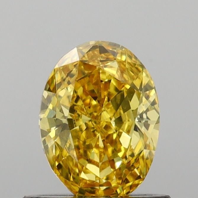 Loose Diamond - OVAL 0.72ct Fancy Vivid Yellow VS2: Loose Diamond - OVAL 0.72ct Fancy Vivid Yellow VS2 Source: This is a real non-mined Diamond that has been grown in a lab Shape: OVAL Carats: 0.72 Color: Fancy Vivid Yellow Certification: IGI Video: