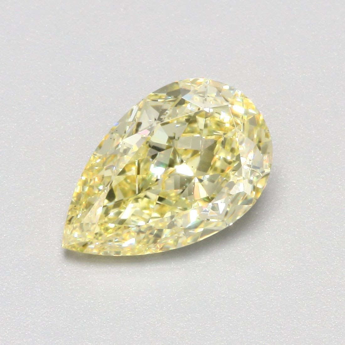 Loose Diamond - PEAR 1.51ct Fancy Intense Yellow VS1: Loose Diamond - PEAR 1.51ct Fancy Intense Yellow VS1 Source: This is a real non-mined Diamond that has been grown in a lab Shape: PEAR Carats: 1.51 Color: Fancy Intense Yellow Certification: IGI Video
