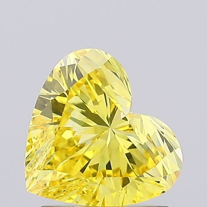 Loose Diamond - HEART 1.06ct Fancy Vivid Yellow VVS2: Loose Diamond - HEART 1.06ct Fancy Vivid Yellow VVS2 Source: This is a real non-mined Diamond that has been grown in a lab Shape: HEART Carats: 1.06 Color: Fancy Vivid Yellow Certification: IGI Video: