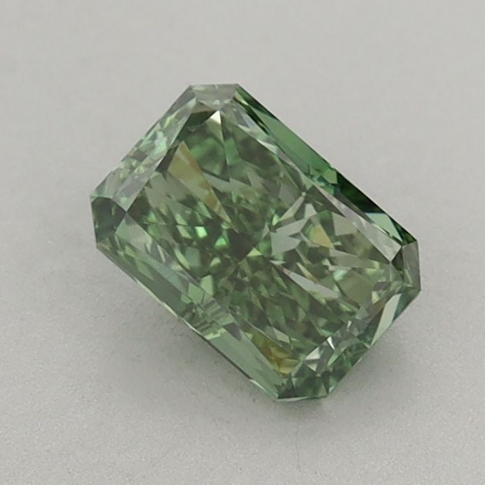 Loose Diamond - RADIANT 0.78ct Fancy Vivid Green VS1: Loose Diamond - RADIANT 0.78ct Fancy Vivid Green VS1 Source: This is a real non-mined Diamond that has been grown in a lab Shape: RADIANT Carats: 0.78 Color: Fancy Vivid Green Certification: IGI Video