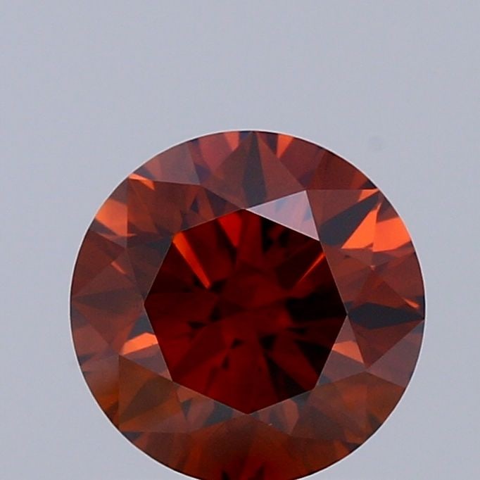 Loose Diamond - ROUND 1.01ct Fancy Deep Orange VS2: Loose Diamond - ROUND 1.01ct Fancy Deep Orange VS2 Source: This is a real non-mined Diamond that has been grown in a lab Shape: ROUND Carats: 1.01 Color: Fancy Deep Orange Certification: IGI Video: