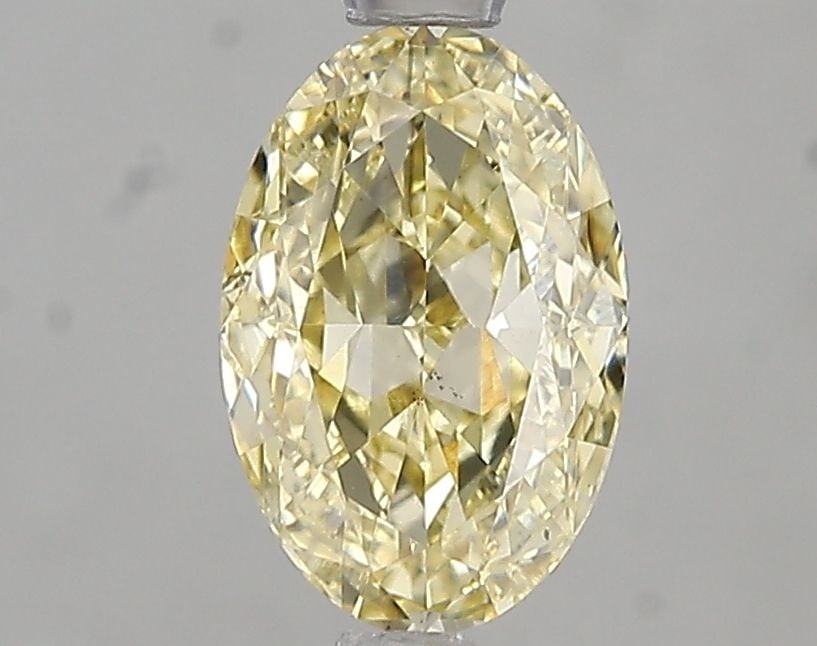 Loose Diamond - OVAL 1.5ct Fancy Intense Yellow VS2: Loose Diamond - OVAL 1.5ct Fancy Intense Yellow VS2 Source: This is a real non-mined Diamond that has been grown in a lab Shape: OVAL Carats: 1.5 Color: Fancy Intense Yellow Certification: IGI Video: