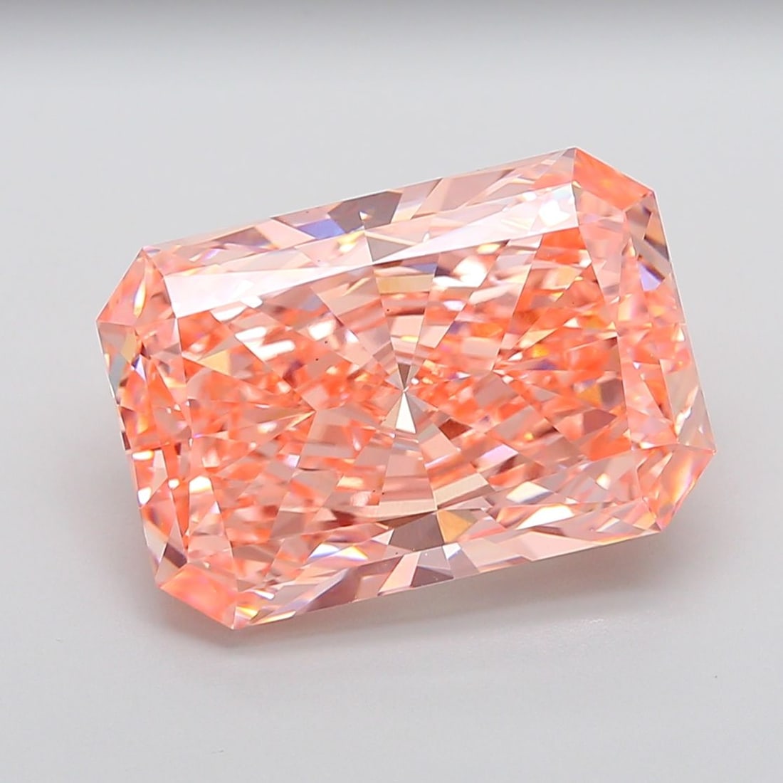 Loose Diamond - RADIANT 14.72ct Fancy Vivid Pink VS2: Loose Diamond - RADIANT 14.72ct Fancy Vivid Pink VS2 Source: This is a real non-mined Diamond that has been grown in a lab Shape: RADIANT Carats: 14.72 Color: Fancy Vivid Pink Certification: IGI Addit