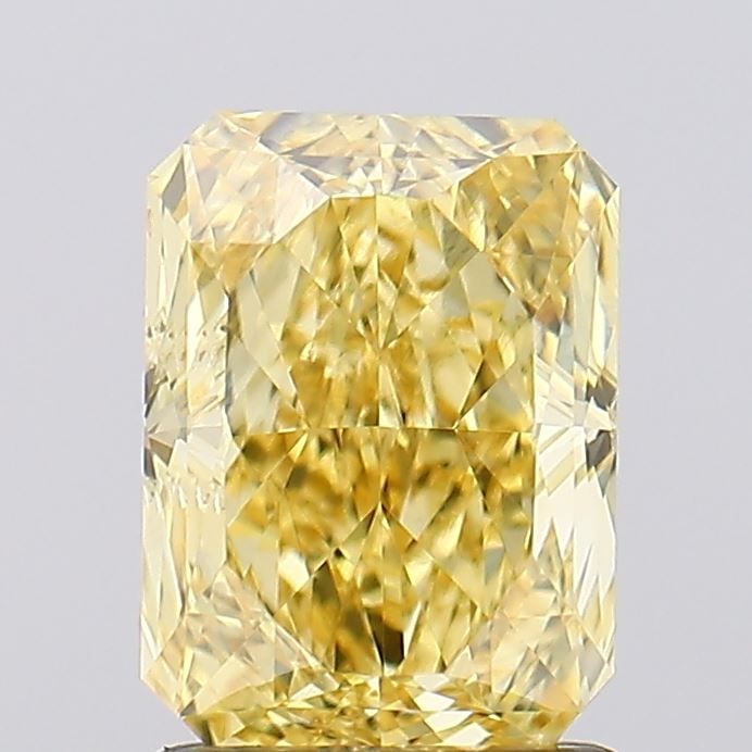 Loose Diamond - RADIANT 1.5ct Fancy Vivid Yellow VS2: Loose Diamond - RADIANT 1.5ct Fancy Vivid Yellow VS2 Source: This is a real non-mined Diamond that has been grown in a lab Shape: RADIANT Carats: 1.5 Color: Fancy Vivid Yellow Certification: IGI Video