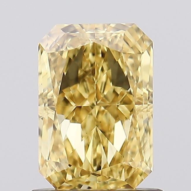 Loose Diamond - RADIANT 1.25ct Fancy Vivid Yellow VS2: Loose Diamond - RADIANT 1.25ct Fancy Vivid Yellow VS2 Source: This is a real non-mined Diamond that has been grown in a lab Shape: RADIANT Carats: 1.25 Color: Fancy Vivid Yellow Certification: IGI Vid